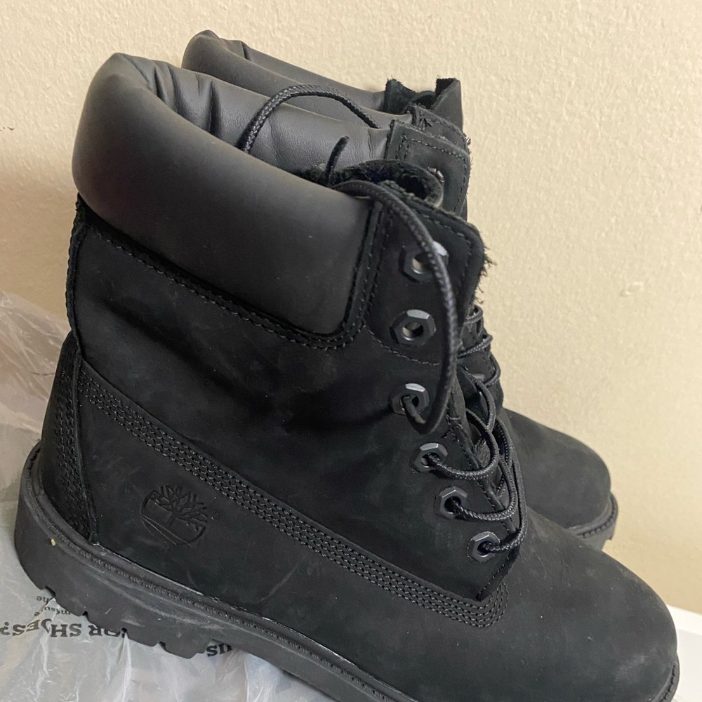 Black Timberland shoes, size 6.5.